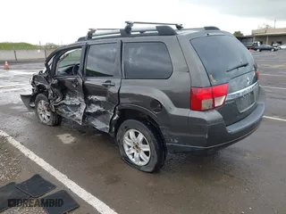 2011 Mitsubishi Endeavor LS with VIN 4A4JN2AS2BE035817, listed as a IAAI auction lot 41861391 with 223,657 mi miles. Bid and sale history available at carsss.com. Image 3.