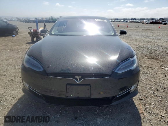 2019 Tesla Model S 100D with VIN 5YJSA1E42KF331240, listed as a Copart auction lot 54713975 with 43,940 mi miles and Salvage title. Bid and sale history available at DreamBid. Image 5.