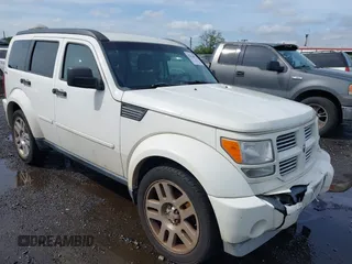 2010 Dodge Nitro Heat z VIN 1D4PU4GKXAW175021, wystawiony jako IAAI lot #42274875 z przebiegiem 158 279 mil mil oraz . Historia ofert i sprzedaży dostępna na DreamBid. Obrazek 1.