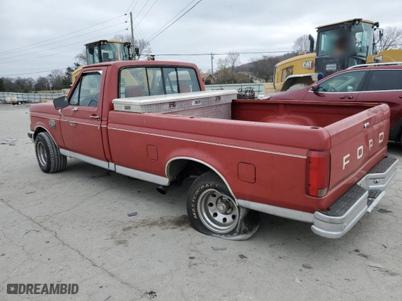 1988 Ford 1/2 Ton Trucks with VIN 1FTDF15Y5JLA36545, listed as a Copart auction lot 82768994 with 518,107 mi miles and Salvage Title. Bid and sale history available at carsss.com. Image 2.