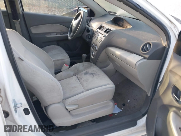 2010 Toyota Yaris with VIN JTDBT4K33A1394734, listed as a IAAI auction lot 40704798 with 156,032 mi miles. Bid and sale history available at carsss.com. Image 5.