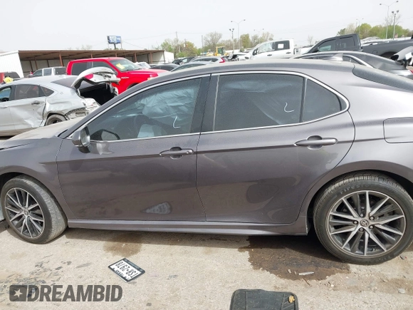 2023 Toyota Camry SE with VIN 4T1G11AK3PU721350, listed as a IAAI auction lot 41835561 with 102,237 mi miles and . Bid and sale history available at DreamBid. Image 14.