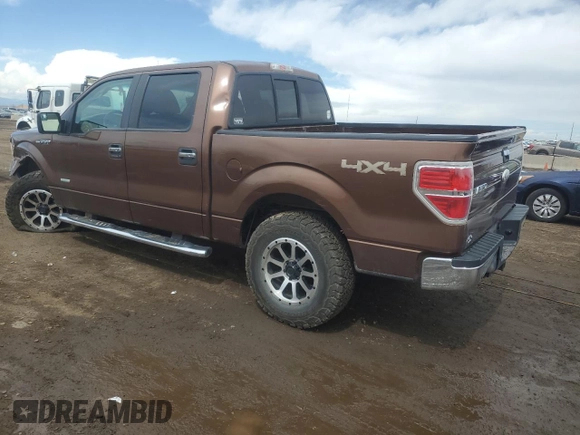 2011 Ford F-150 XLT with VIN 1FTFW1ETXBFB51042, listed as a Copart auction lot 51473695 with 179,195 mi miles and Salvage Title. Bid and sale history available at carsss.com. Image 2.