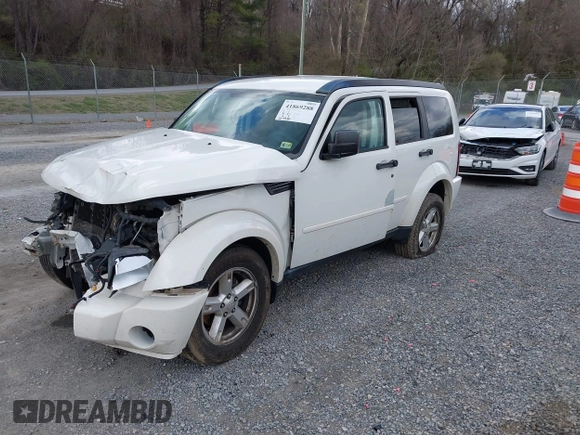 2007 Dodge Nitro SXT with VIN 1D8GU28K77W727391, listed as a IAAI auction lot 41869288 with 214,920 mi miles. Bid and sale history available at carsss.com. Image 22.