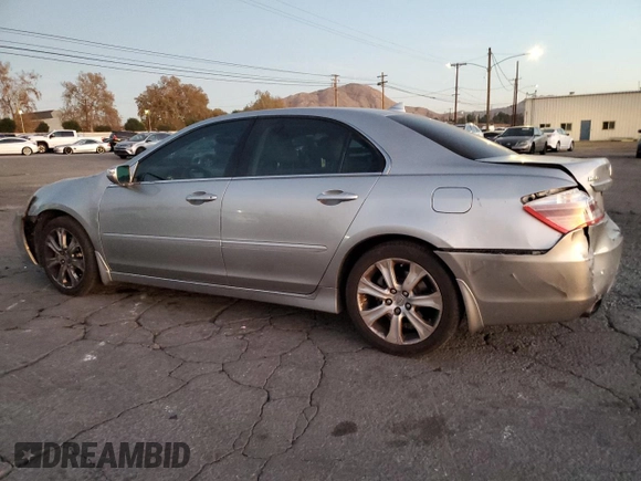 2009 Acura RL Tech Pkg with VIN JH4KB266X9C002410, listed as a Copart auction lot 85615504 with 192,840 mi miles and Salvage Title. Bid and sale history available at carsss.com. Image 2.