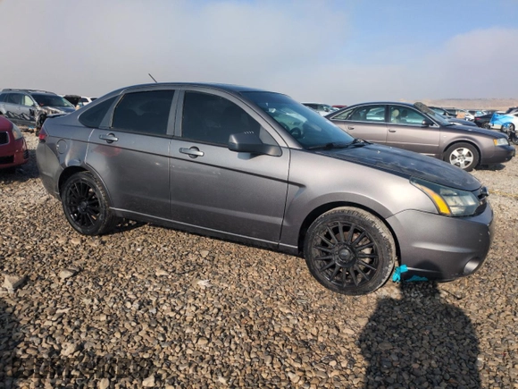 2011 Ford Focus SES with VIN 1FAHP3GNXBW108570, listed as a Copart auction lot 81977954 with 147,563 mi miles and Salvage Title. Bid and sale history available at carsss.com. Image 4.