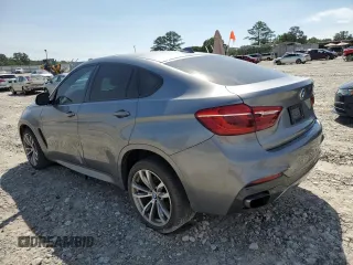 2016 BMW X6 xDrive50i with VIN 5UXKU6C52G0S82464, listed as a Copart auction lot 63145703 with 80,064 mi miles. Bid and sale history available at carsss.com. Image 2.