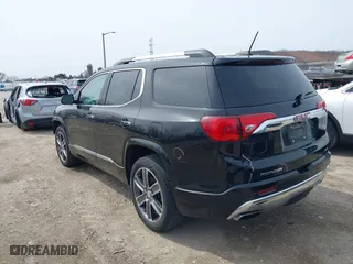 2017 GMC Acadia Denali with VIN 1GKKNXLS3HZ136182, listed as a IAAI auction lot 41934256 with 165,207 mi miles. Bid and sale history available at carsss.com. Image 3.