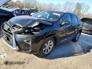 2016 Lexus RX 350 with VIN JTJBZMCA5G2003594, listed as a Copart auction lot 83015824 with 122,808 mi miles and Salvage Title. Bid and sale history available at DreamBid. Image 1.