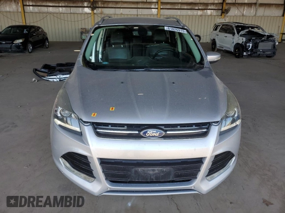 2015 Ford Escape Titanium with VIN 1FMCU9J96FUB33670, listed as a Copart auction lot 61826915 with 179,794 mi miles and Salvage title. Bid and sale history available at DreamBid. Image 5.