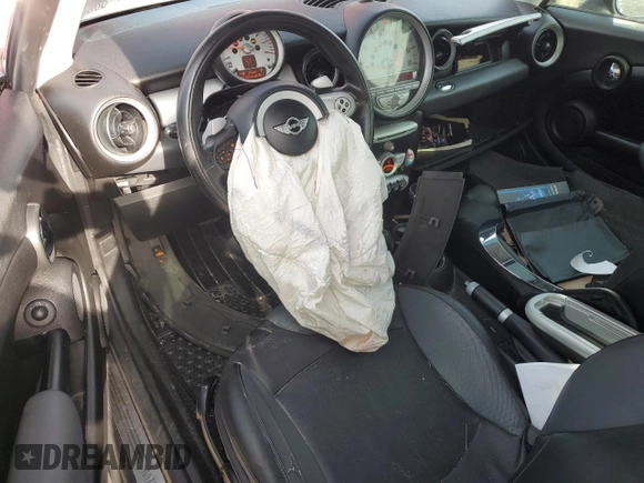 2007 MINI Hardtop with VIN WMWMF33577TT52975, listed as a Copart auction lot 53909855 with 127,325 mi miles and Salvage title. Bid and sale history available at DreamBid. Image 8.