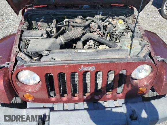 2007 Jeep Wrangler Sahara z VIN 1J8FA54187L131573, wystawiony jako Copart lot #44863875 z przebiegiem 205 221 mil mil oraz Szkoda całkowita • Salvage title. Historia ofert i sprzedaży dostępna na DreamBid. Obrazek 11.