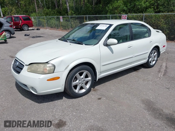 2003 Nissan Maxima SE z VIN JN1DA31DX3T501453, wystawiony jako IAAI lot #42116346 z przebiegiem 127 364 mil mil oraz . Historia ofert i sprzedaży dostępna na DreamBid. Obrazek 2.