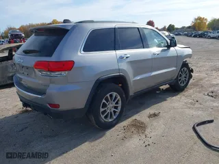 2014 Jeep Grand Cherokee Limited with VIN 1C4RJFBG4EC579551, listed as a IAAI auction lot 40656764 with 132,080 mi miles. Bid and sale history available at carsss.com. Image 4.