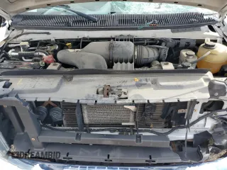 2011 Ford Econoline Passenger XL with VIN 1FBNE3BLXBDA75840, listed as a Copart auction lot 72030614 with 57,183 mi miles and Salvage Title. Bid and sale history available at DreamBid. Image 12.