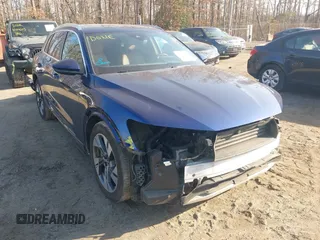 2021 Audi e-tron Premium Plus with VIN WA1LAAGE3MB028896, listed as a IAAI auction lot 41415811 with 39,770 mi miles. Bid and sale history available at carsss.com. Image 1.
