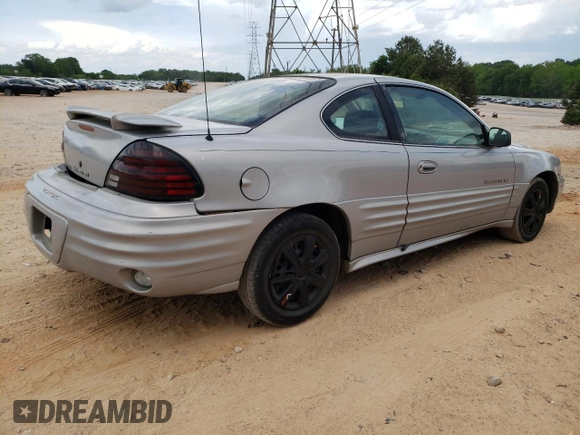 1999 Pontiac Grand Am z VIN 1G2NE12E3XM901263, wystawiony jako Copart lot #55723445 z przebiegiem 163 946 mil mil oraz Szkoda całkowita • Salvage title. Historia ofert i sprzedaży dostępna na DreamBid. Obrazek 3.