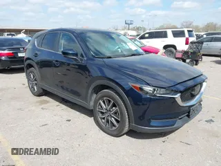 2018 Mazda CX-5 Touring with VIN JM3KFACM3J1370129, listed as a IAAI auction lot 41829027 with 71,305 mi miles. Bid and sale history available at carsss.com. Image 1.