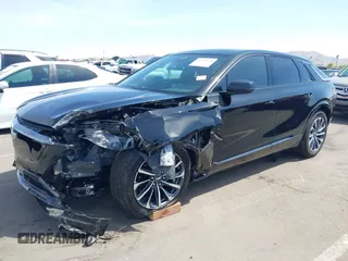 2024 Cadillac LYRIQ Sport z VIN 1GYKPVRK6RZ131099, wystawiony jako IAAI lot #41979330 z przebiegiem 3953 mil mil oraz . Historia ofert i sprzedaży dostępna na DreamBid. Obrazek 6.