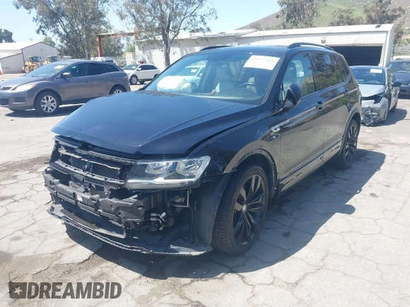 2021 Volkswagen Tiguan SE with VIN 3VV3B7AX0MM015825, listed as a IAAI auction lot 41955268 with 57,909 mi miles and . Bid and sale history available at DreamBid. Image 20.