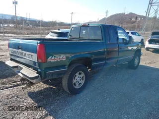 1997 Chevrolet Silverado 1500 with VIN 2GCEK19R5V1186749, listed as a IAAI auction lot 41738002 with 235,184 mi miles and . Bid and sale history available at DreamBid. Image 4.