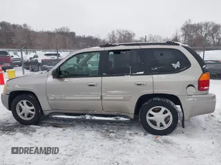 2002 GMC Envoy SLT with VIN 1GKDT13S022333743, listed as a IAAI auction lot 41562458 with 193,087 mi miles. Bid and sale history available at carsss.com. Image 14.
