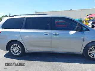 2015 Toyota Sienna XLE with VIN 5TDYK3DC3FS631916, listed as a IAAI auction lot 42043495 with 76,986 mi miles and . Bid and sale history available at DreamBid. Image 13.
