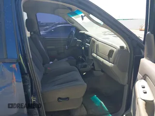 2004 Dodge 1500 SLT with VIN 1D7HA18N04J144868, listed as a IAAI auction lot 41870559 with 157,379 mi miles. Bid and sale history available at carsss.com. Image 5.