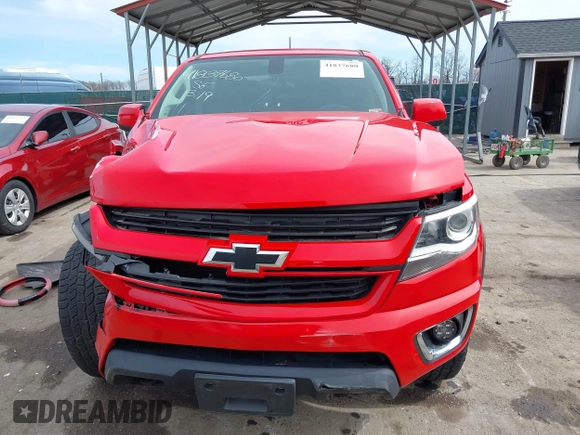 2018 Chevrolet Colorado 4WD Z71 z VIN 1GCGTDEN8J1141945, wystawiony jako IAAI lot #41837680 z przebiegiem 67 686 mil mil oraz . Historia ofert i sprzedaży dostępna na DreamBid. Obrazek 12.
