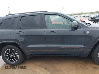 2018 Jeep Grand Cherokee Trailhawk with VIN 1C4RJFLG6JC320763, listed as a IAAI auction lot 41871683 with 115,417 mi miles and . Bid and sale history available at DreamBid. Image 13.