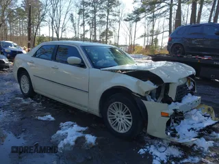 2009 Chrysler 300 Touring with VIN 2C3KA53V99H621745, listed as a IAAI auction lot 41604655 with 115,004 mi miles. Bid and sale history available at carsss.com. Image 1.