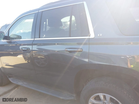 2020 Chevrolet Tahoe LT with VIN 1GNSCBKCXLR309128, listed as a IAAI auction lot 41641948 with 104,571 mi miles. Bid and sale history available at carsss.com. Image 14.