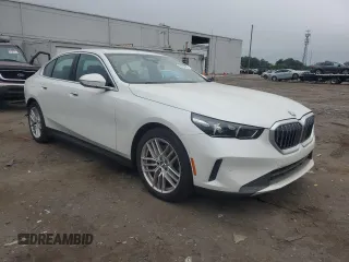 2024 BMW 5 Series 540i xDrive with VIN WBA63FJ01RCR67129, listed as a Copart auction lot 62095995 with 5,075 mi miles and Salvage title. Bid and sale history available at DreamBid. Image 4.