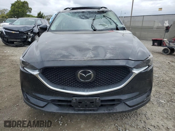 2018 Mazda CX-5 Grand Touring with VIN JM3KFADM3J1370114, listed as a Copart auction lot 54579585 with 65,513 mi miles and Salvage Title. Bid and sale history available at DreamBid. Image 5.