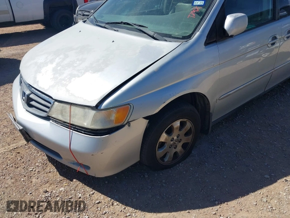 2004 Honda Odyssey EX-L with VIN 5FNRL18904B080009, listed as a IAAI auction lot 41736651 with 461,326 mi miles and . Bid and sale history available at DreamBid. Image 6.