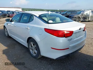 2015 Kia Optima LX with VIN 5XXGM4A77FG360573, listed as a IAAI auction lot 42648488 with 132,409 mi miles and . Bid and sale history available at DreamBid. Image 3.