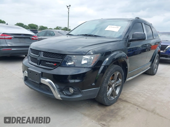 2014 Dodge Journey Crossroad with VIN 3C4PDCGG9ET264920, listed as a IAAI auction lot 42141229 with 127,648 mi miles and . Bid and sale history available at DreamBid. Image 2.