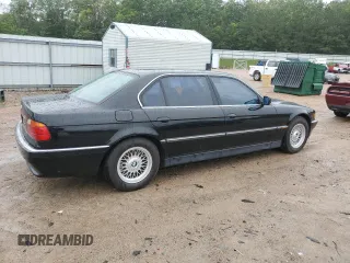 1997 BMW 7 Series 740iL z VIN WBAGJ8324VDM01488, wystawiony jako Copart lot #57942315 z przebiegiem 183 273 mil mil oraz Tytuł czysty. Historia ofert i sprzedaży dostępna na DreamBid. Obrazek 3.