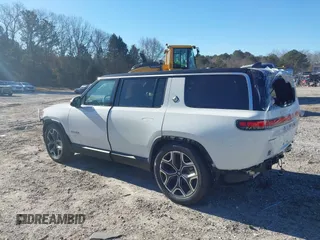 2025 Rivian R1S Adventure with VIN 7PDSGBBA0SN049154, listed as a IAAI auction lot 41160166 with 3,036 mi miles. Bid and sale history available at carsss.com. Image 3.