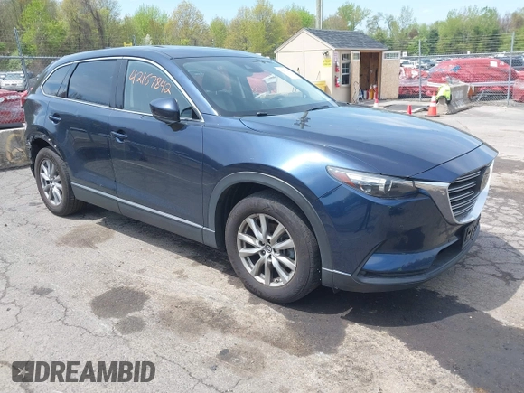 2019 Mazda CX-9 Touring z VIN JM3TCBCY6K0331905, wystawiony jako IAAI lot #42157842 z przebiegiem 84 211 mil mil oraz . Historia ofert i sprzedaży dostępna na DreamBid. Obrazek 1.