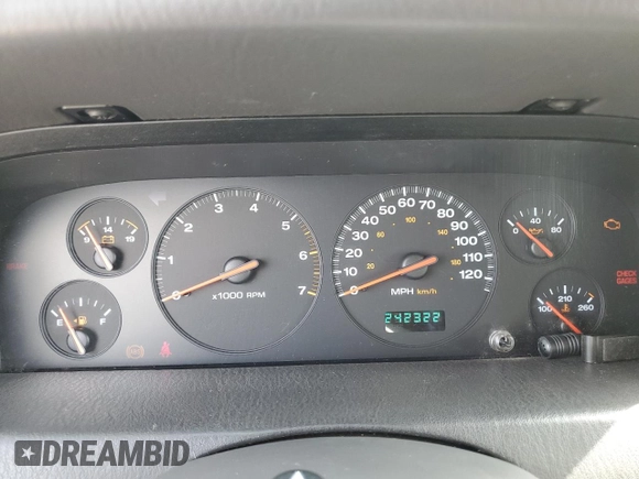 2000 Jeep Grand Cherokee Laredo with VIN 1J4GW48N1YC324356, listed as a Copart auction lot 62011305 with 242,322 mi miles and Salvage title. Bid and sale history available at DreamBid. Image 9.