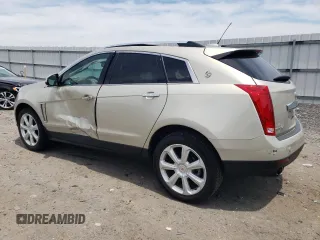 2016 Cadillac SRX Performance Collection with VIN 3GYFNCE32GS508631, listed as a Copart auction lot 60660554 with 92,025 mi miles and Salvage title. Bid and sale history available at DreamBid. Image 2.