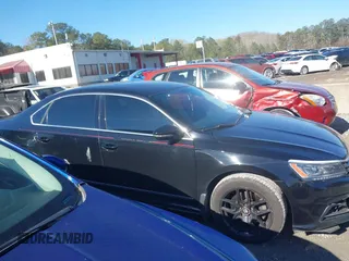 2016 Volkswagen Passat SE with VIN 1VWBT7A30GC049027, listed as a IAAI auction lot 41878460 with 125,261 mi miles and . Bid and sale history available at DreamBid. Image 13.
