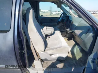 1999 Ford F-150 with VIN 2FTRX17L8XCB23329, listed as a IAAI auction lot 41448347 with 223,517 mi miles and . Bid and sale history available at DreamBid. Image 5.