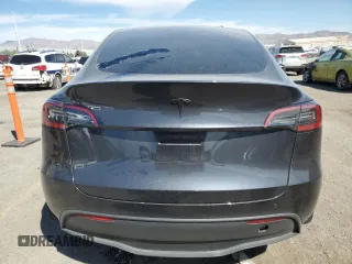 2024 Tesla Model Y Long Range z VIN 7SAYGDEE9RA255805, wystawiony jako Copart lot #50836555 z przebiegiem Nie podano mil oraz Szkoda całkowita • Salvage title. Historia ofert i sprzedaży dostępna na DreamBid. Obrazek 6.