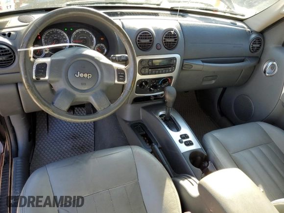 2007 Jeep Liberty Limited with VIN 1J4GK58K57W545530, listed as a Copart auction lot 86285824 with 141,007 mi miles and Salvage title. Bid and sale history available at DreamBid. Image 8.