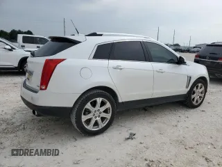 2014 Cadillac SRX Performance Collection with VIN 3GYFNCE34ES659404, listed as a Copart auction lot 54991955 with 169,308 mi miles and Clean title. Bid and sale history available at DreamBid. Image 3.