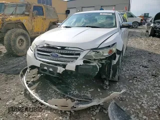 2012 Ford Taurus Limited z VIN 1FAHP2FW0CG126852, wystawiony jako Copart lot #56157325 z przebiegiem 222 514 mil mil oraz Szkoda całkowita • Salvage title. Historia ofert i sprzedaży dostępna na DreamBid. Obrazek 13.