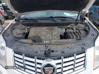 2013 Cadillac SRX Performance Collection z VIN 3GYFNDE38DS542736, wystawiony jako IAAI lot #42398648 z przebiegiem 266 059 mil mil oraz . Historia ofert i sprzedaży dostępna na DreamBid. Obrazek 10.