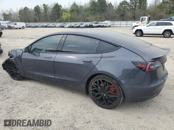 2021 Tesla Model 3 Performance with VIN 5YJ3E1EC5MF984986, listed as a Copart auction lot 52010205 with 48,012 mi miles and Salvage Title. Bid and sale history available at DreamBid. Image 2.